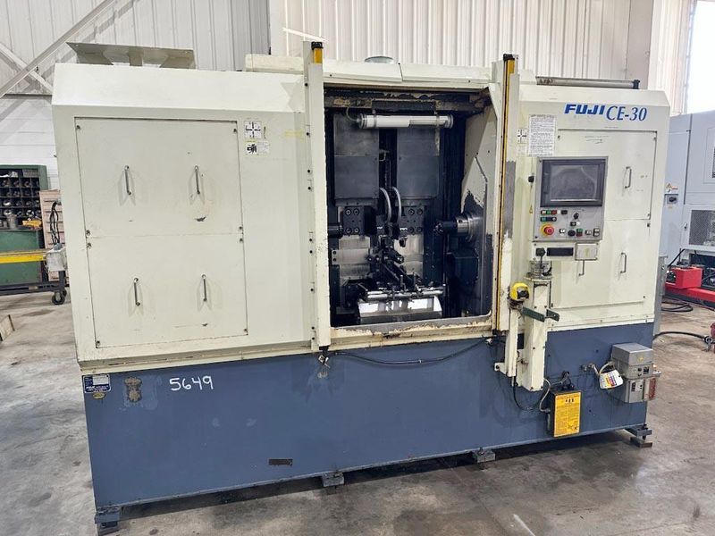 FUJI MODEL CE-30 CNC DOUBLE END FACING & CENTERING MACHINE