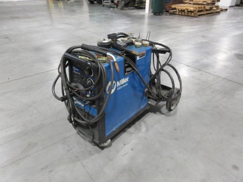 Millermatic 251 MIG Wire Feed Welder with Rolling Base and Accessories, 200/230V Single Phase- Auction Item