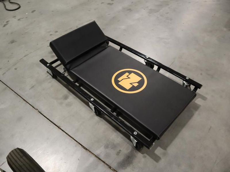 Northern Tool 44"L,  Wide Cushion Creeper with 6 Swivel Wheels and Adjustable Head Rest- Auction Item