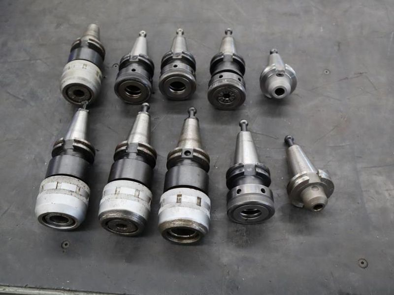 CT40 Taper Tool Holders: (4) Nikken KM-1 Collet Holders, (4) XCN-1000 Collet Holders, (1) End Mill Holder- Auction Item