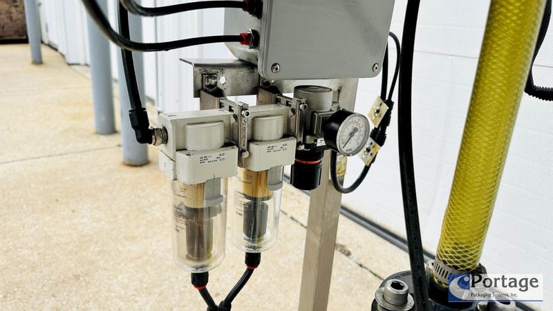 Inline Filling Systems  | Six-Headed Semi-Automatic  |  Overflow Filler