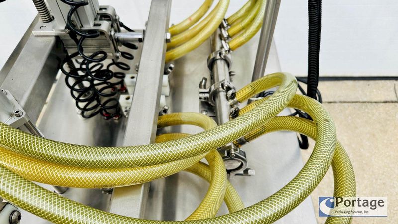 Inline Filling Systems  | Six-Headed Semi-Automatic  |  Overflow Filler