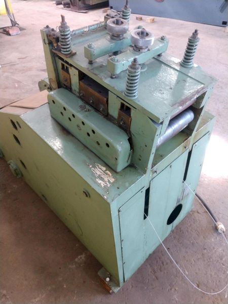 9.8" X .059" AIDA MODEL #LM-2532 9 ROLL POWERED COIL STRIP STRAIGHTENER: STOCK 14441