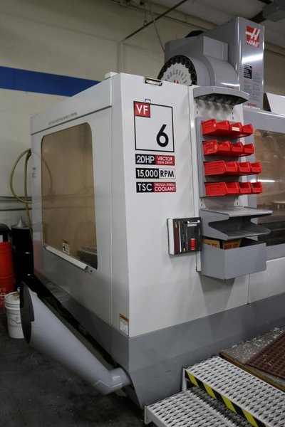 HAAS VF6D/40 VERTICAL MACHINING CENTER, NEW 2006, 15,000 RPM SPINDLE WITH THRU SPINDLE COOLANT