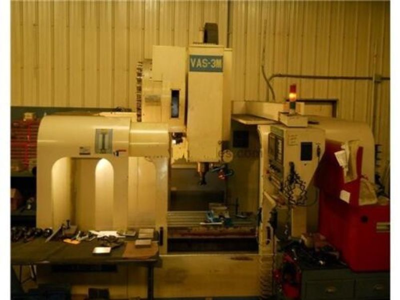EQUIPPED WITH FANUC O-MD CONTROL, 7500 RPM, RIGID TAPPING, CHIP AUGER, THRU SPINDLE COOLANT, 65 TOOL HOLDERS, CAT-40, 48X20 TABLE