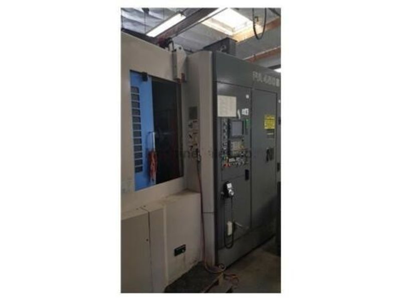 FANUC 16i-M CONTROL, 14,000 RPM, 1 Degree 4TH AXIS, 30 HP, 62 ATC, CAT-40, UNDER POWER & RUNNING Thru Spindle Coolant needs to be reconnected but is included ..Spindle noisy over 8K RPMs