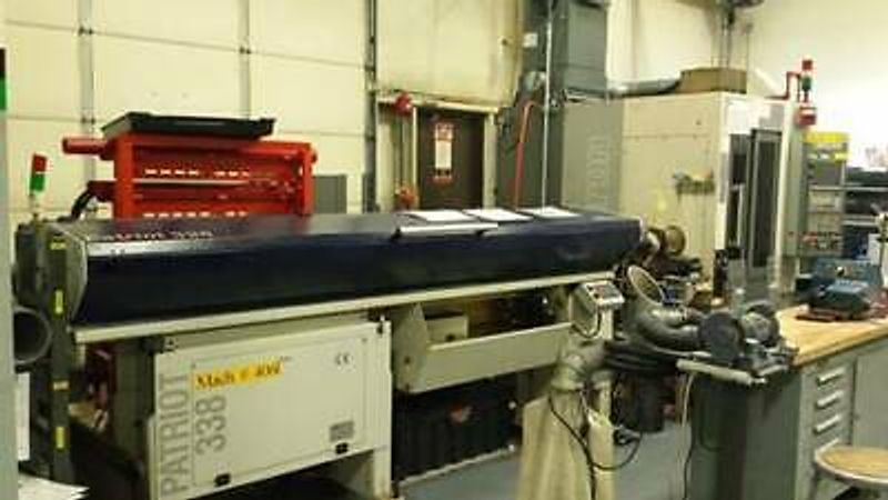 EDGE PATRIOT 338 MAGAZINE BAR FEED KNOLL COOLANT FILTRATION SYSTEM HIGH PRESSURE COOLANT PUMP MSC COOLANT CHILLER 40-STATION AUTOMATIC TOOL CHANGER SWIVEL VISE TOOL TOUCH SETTER SPINDLE PROBE SPINDLE CHILLER PARTS CONVEYOR CHIP CONVEYOR 2-SPINDLE GR