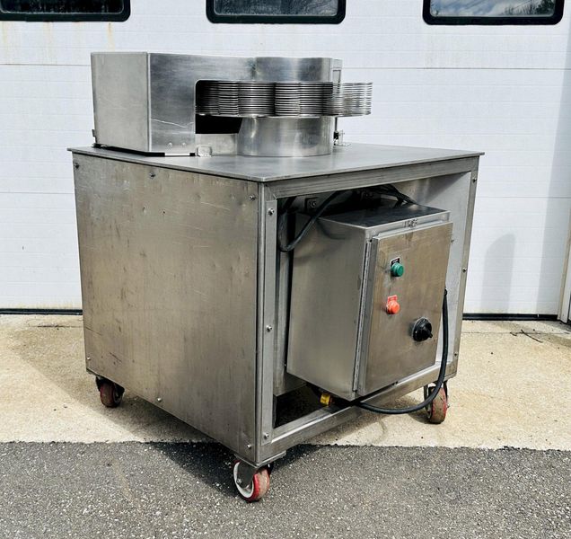 Urschel Laboratories Inc.  |  10 Station Semi-Automatic Rotating Onion Slicer