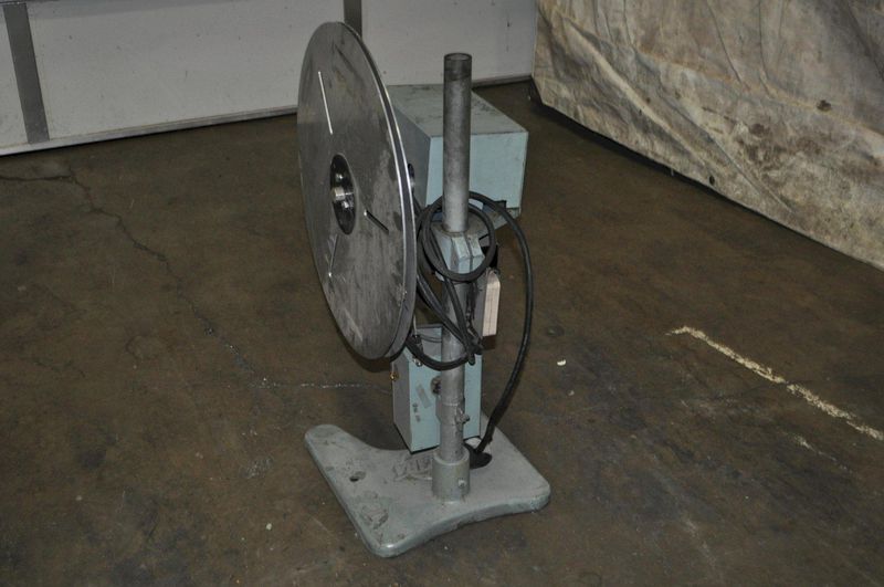 100 LB X 4" FUTABA MOTORIZED UNCOILER