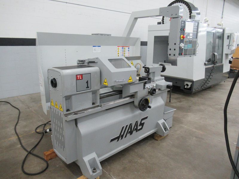 Haas TL-1 CNC Toolroom Lathe with Tailstock, 3-Jaw Chuck, Coolant Tank and Pump, New 2008