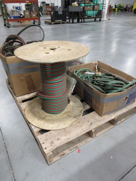 Oxy/Acetylene Torch Parts, Gas Valves, and Partial Spool of New Tubing on Pallet- Auction Item