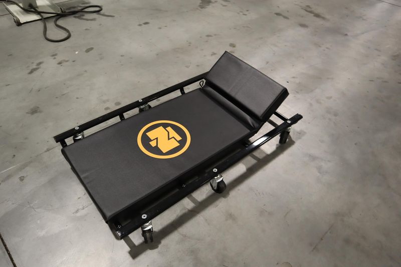 Northern Tool 44"L,  Wide Cushion Creeper with 6 Swivel Wheels and Adjustable Head Rest- Auction Item