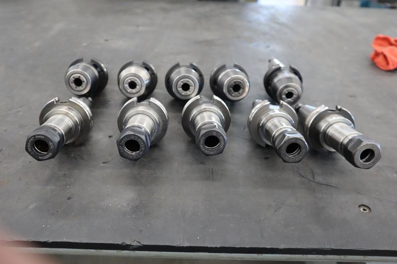 CT40 Taper Tool Holders (10) :(5) Schunk 3/4" Hydraulic Expansion Holders, (5) ER20 Collet Chucks- Auction Item