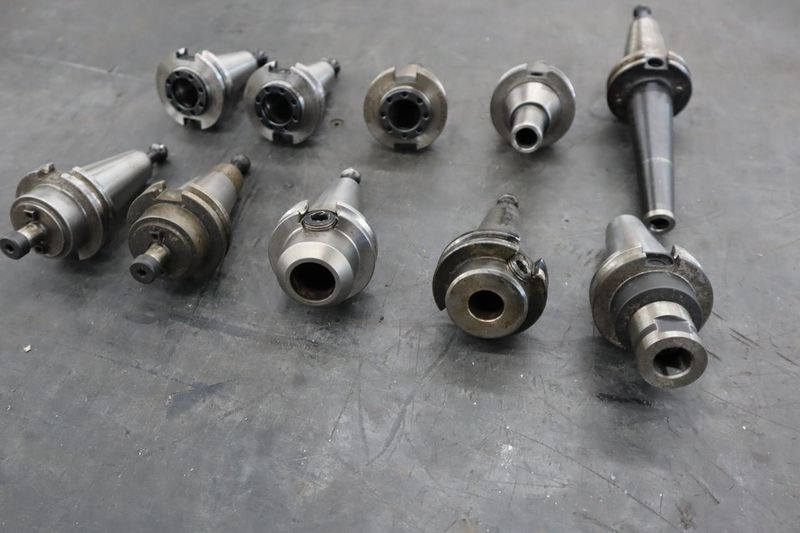 CT40 Taper Tool Holders: (3) Er2 Collet Holders, (2) Shell Mill Drivers, (5) End Mill Holders- Auction Item