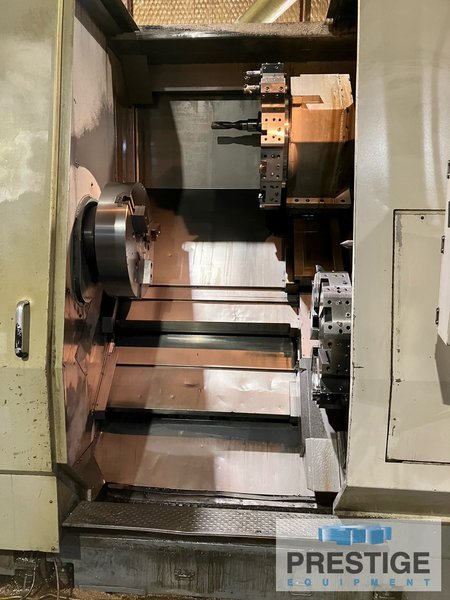 OKUMA Impact LU45 4-Axis, OSP-200L, Upper/Lower Turret, 24" 3-Jaw Chuck, Hyd. Tailstock, Chip Conveyor, Low Hours #32617