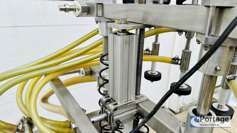 Inline Filling Systems  | Six-Headed Semi-Automatic  |  Overflow Filler