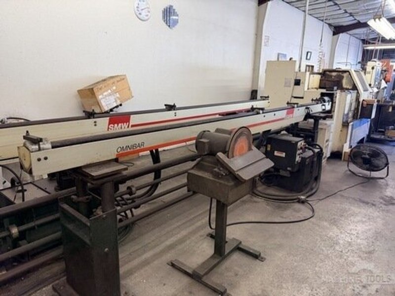 (2) Okuma LNC-8C CNC Lathe, OSP 700L Control, 12 Station Turret, Kitagawa B-08 3 Jaw Chuck, SMW Omnibar Bar Feeder