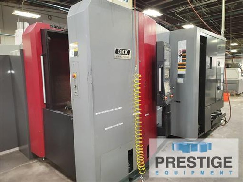 OKK HMC400, Fanuc 31i-B, X-22", Y-22", Z-27", 15.7" Pallets, B-Axis, 60 ATC, 15K RPM, TSC, Chip Conv, 2015, #32909
