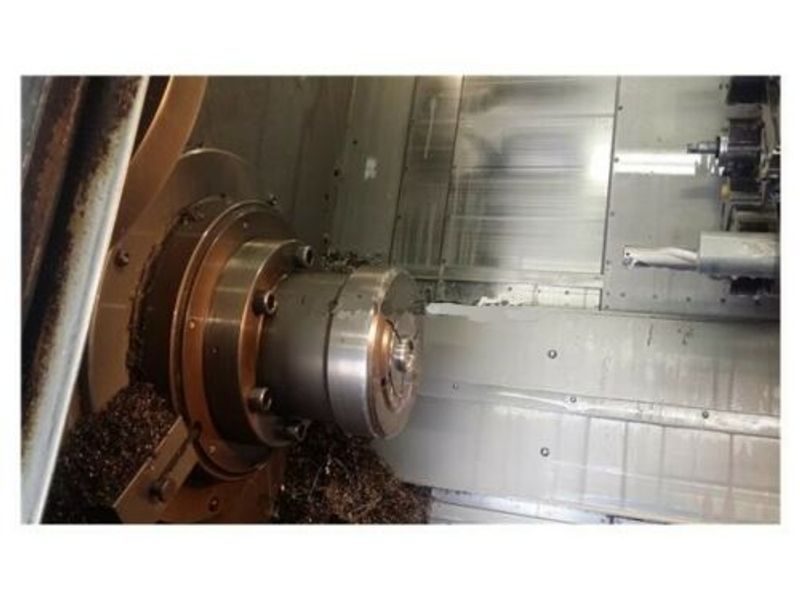 EQUIPPED WITH 4-AXIS, 22X60, FANUC 11TT, 4' SPINDLE HOLE, 15" CHUCK, COLLET HEAD, 60 HP, 3200 RPM, UNDER POWER & RUNNING