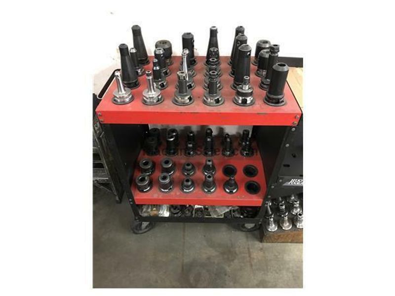 EQUIPPED WITH YASNAC MX-3, FULL 4TH AXIS, LIVE CENTER, 30 ATC, INCLUDES 55 BT-40 TOOL HOLERS, RIGID TAPPING, NEW SPINDLE DRIVE, VERY CLEAN, UNDER POWER & RUNNING