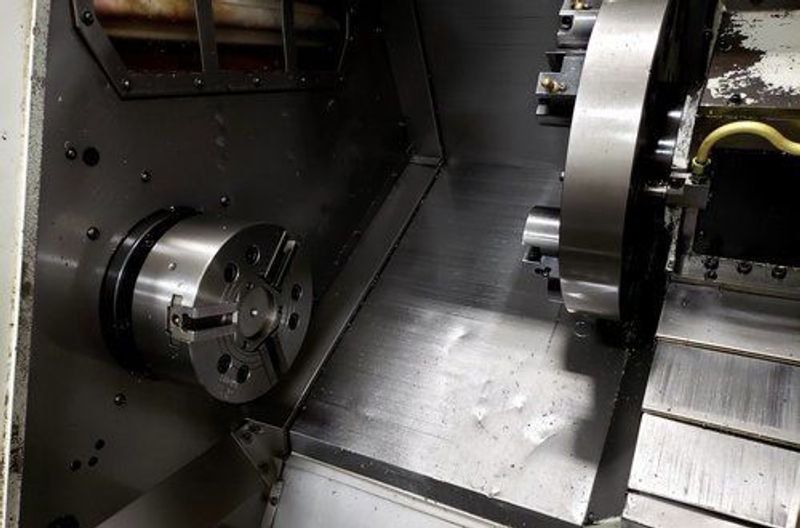 EQUIPPED WITH  10" Chuck  Tool Holders  LCD Upgrade  Turbo Chip Conveyor  Tailstock  New Hydraulic pump motor  Newer Vector drive