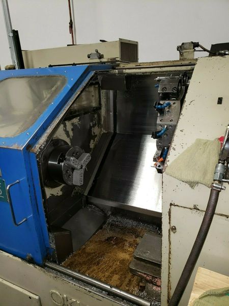 Okuma LB-15 CNC Lathe OSP5000L 8" Chuck 2.44 Bar Capacity