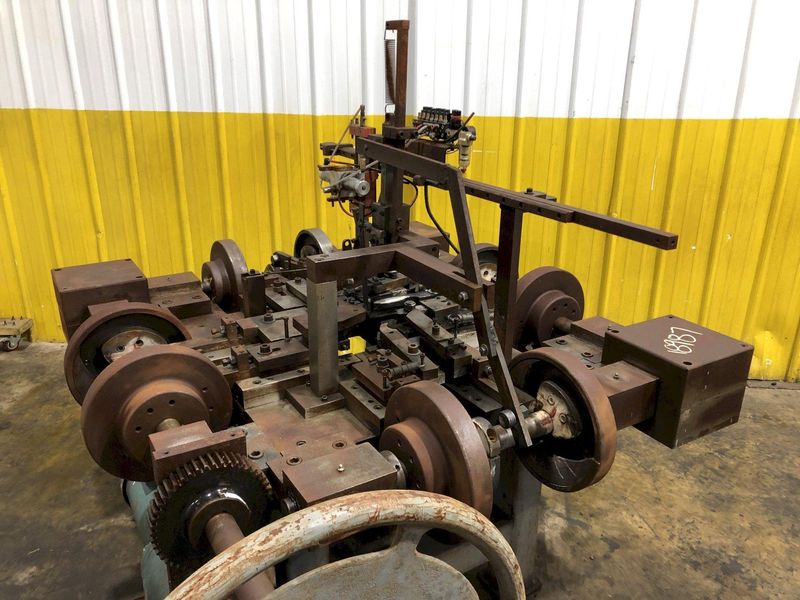FOUR SLIDE WIRE FORMING MACHINE: STOCK #18987