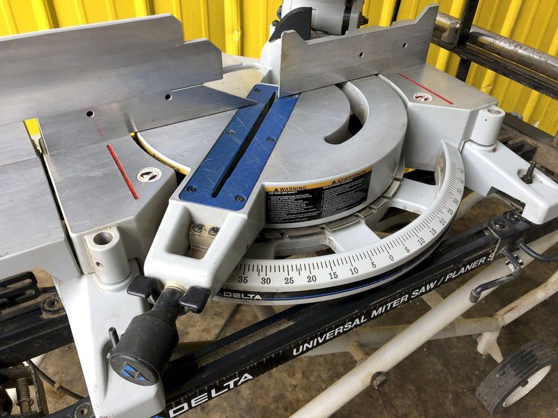 12" DELTA MODEL 36-255L COMPOUND LASER MITER SAW WITH STAND: STOCK 19214