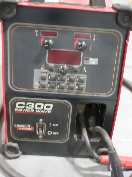 Lincoln Electric Power Wave C300 multi-process power source with an integrated wire feeder- Auction Item