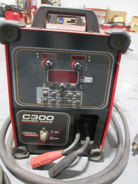 Lincoln Electric Power Wave C300 multi-process power source with an integrated wire feeder- Auction Item