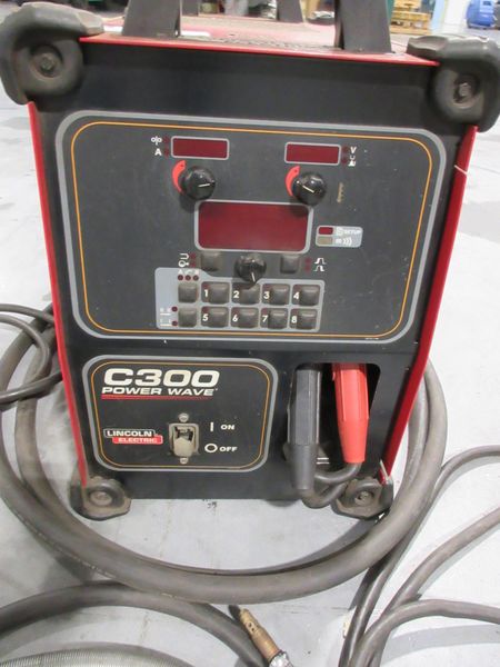 Lincoln Electric Power Wave C300 multi-process power source with an integrated wire feeder- Auction Item