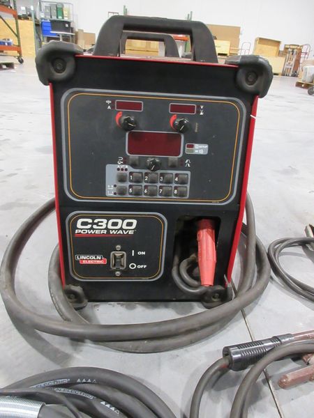 Lincoln Electric Power Wave C300 multi-process power source with an integrated wire feeder- Auction Item