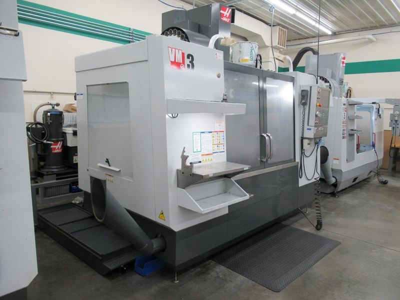 Haas VM-3 CNC Vertical Machining Center, Haas MainCon Ctrl, 4th & 5th Axis Drive, 1000 PSI TSC, Probing, High Speed Machining, 24+1, RJH- Auction Item