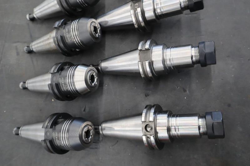 CT40 Taper Tool Holders (10) :(5) Schunk 3/4" Hydraulic Expansion Holders, (5) ER20 Collet Chucks- Auction Item