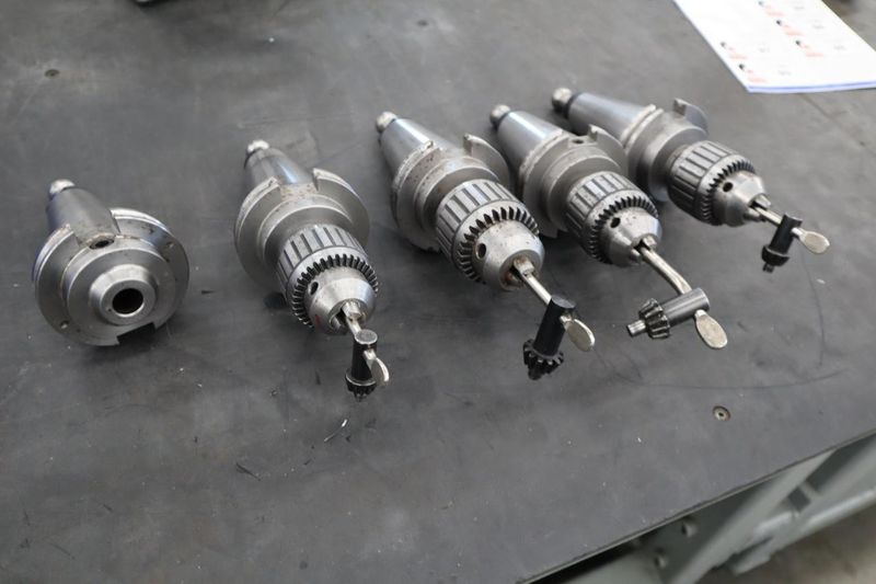 CT50 Taper Tool Holders: (4) w Jacobs Drill Chucks, (1) End Mill Holder, Haas Retention Knobs- Auction Item
