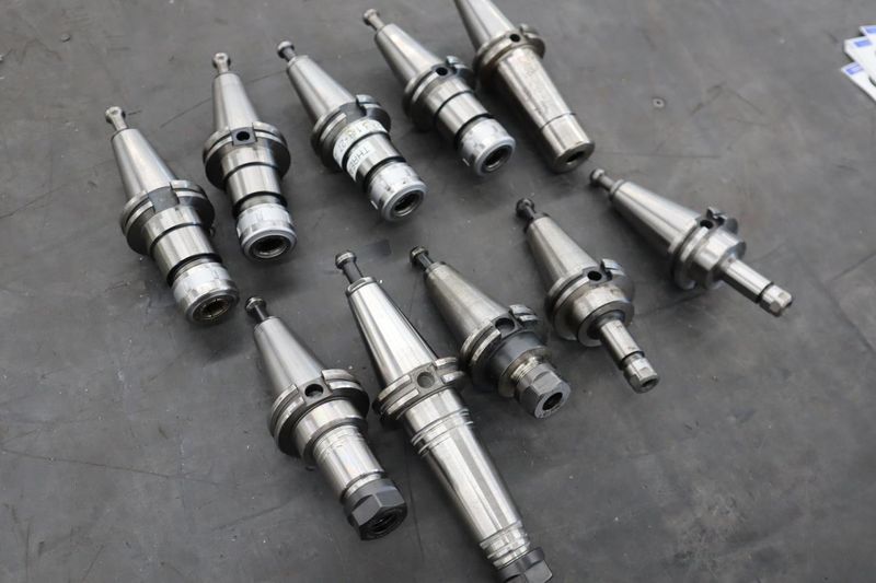 CT40 Taper Tool Holders: (4) Nikken Sk-16B, (1) Nikken SK-15B, (2) SK-6, (3) ER20 Collet Holders- Auction Item