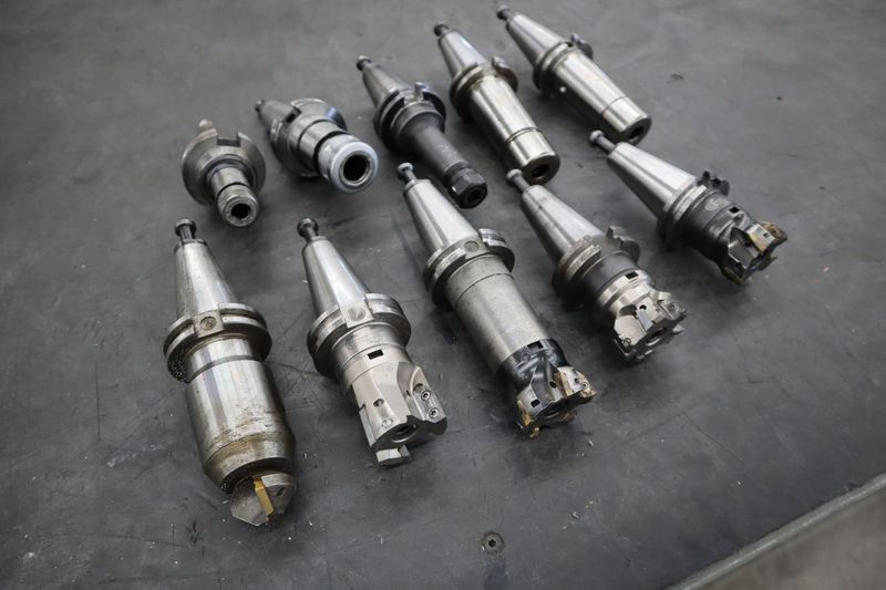 CT40 Taper Tool Holders, Assorted Collet Holders and Insert Milling Cutters- Auction Item