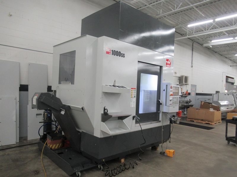 Haas UMC-1000SS CNC 5-Axis Vertical Machining Center, 40"x25"x25", 12K RPM, Chip Con, 30 ATC, Probing, TS Coolant, Air-Vise