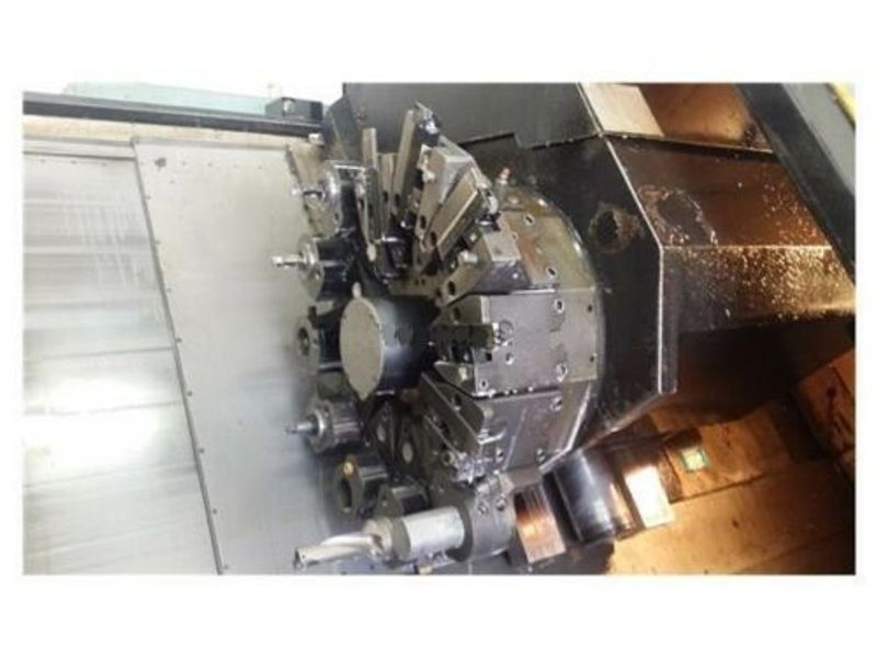 EQUIPPED WITH 4-AXIS, 22X60, FANUC 11TT, 4' SPINDLE HOLE, 15" CHUCK, COLLET HEAD, 60 HP, 3200 RPM, UNDER POWER & RUNNING