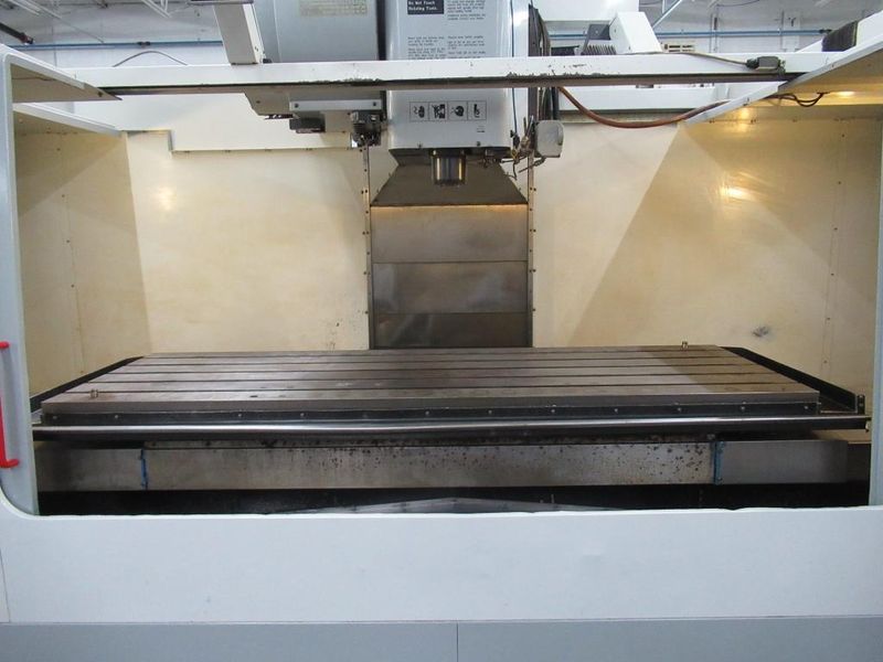 Haas VF-7D/40 CNC Vertical Machining Center, 24 Station ATC, 4th-Axis Brushless Drive, Programmable Coolant Nozzle, Chip Auger