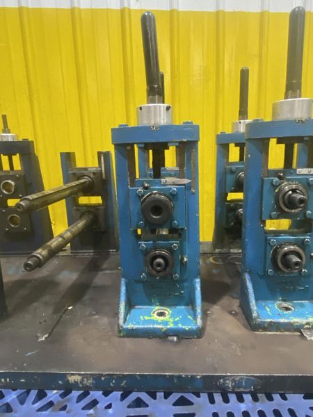 4 STAND X 1.5" X 11" YODER ROLLFORMER STANDS ON 6 STAND RAFTED BASE: STOCK #16781