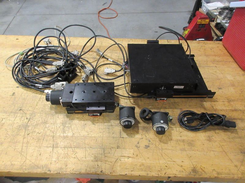 Motorized Precision Stages with Renishaw RGH22 X30D00 Encoders, (2) Stages, (1) 4" x 6", (1) 10" x 10", Extra Motors and Cables- Auction Item