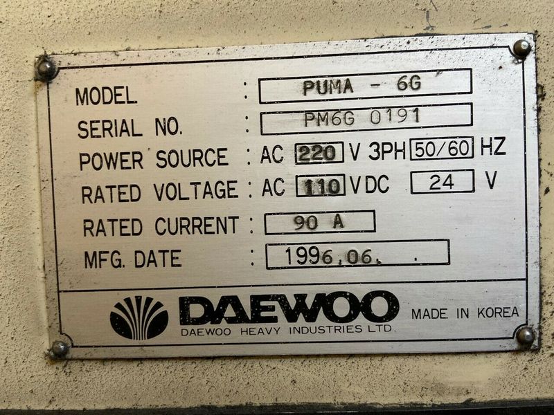 Box Way Machine 1996 DAEWOO PUMA 6G Fanuc OT GANG TOOL CNC LATHE, CHIP CONVEYOR, ASSORTED TOOLING ie fixtures and jaws  ($1000 value) /  not under power anymore but in excellent condition