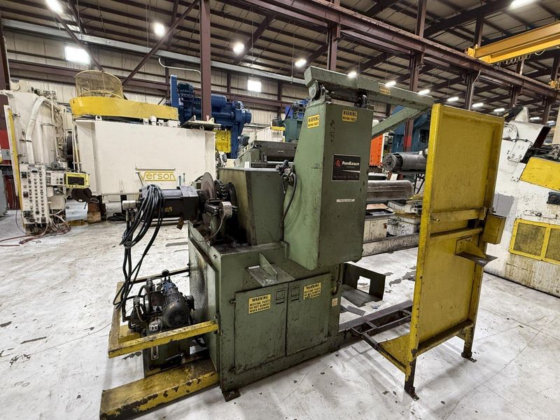 15,000 lbs. x 24" wide Feed Lease Coil Reel with Feed Lease Powered Straightener For Sale - Mode
