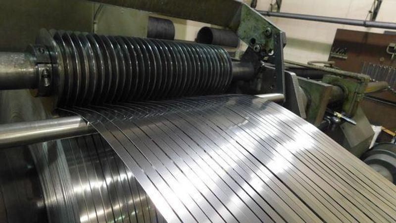 26" x.105" x 20,000# Ruesch Slitting Line with Slip Core Drum