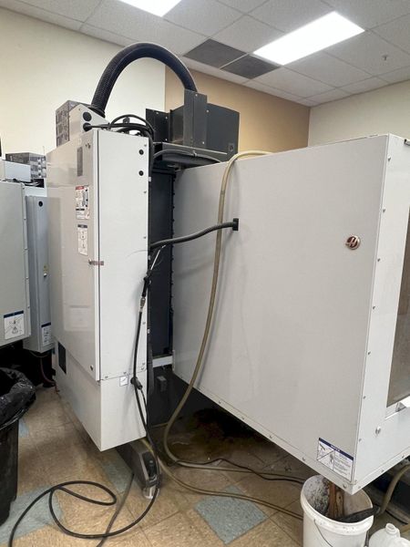 HAAS VERTICAL MACHINING CENTER, MODEL TM-2P, 57.75" x 10.5" TABLE, CT 40, 6000 RPM, 2013