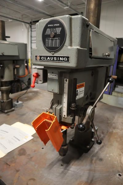 Clausing Model 2236 20" Drill Presses (2) on Steel Table, 2-Speed Motors, Hand Quill Feeds, Jacobs Drill Chucks, Safety Shields- Auction Item