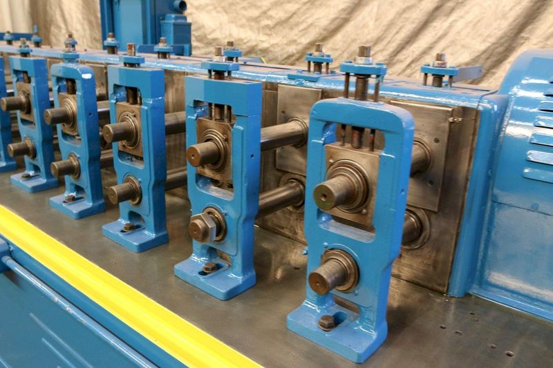 10 STAND X 2.5' TISHKEN MODEL 10HW2-1/2 ROLLFORMER: STOCK #69300