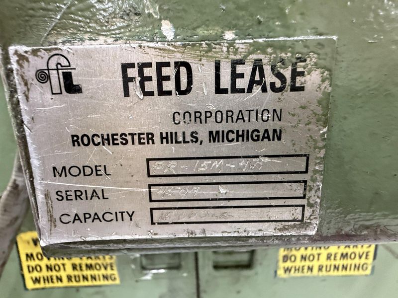 15,000 lbs. x 24" wide Feed Lease Coil Reel with Feed Lease Powered Straightener For Sale - Mode