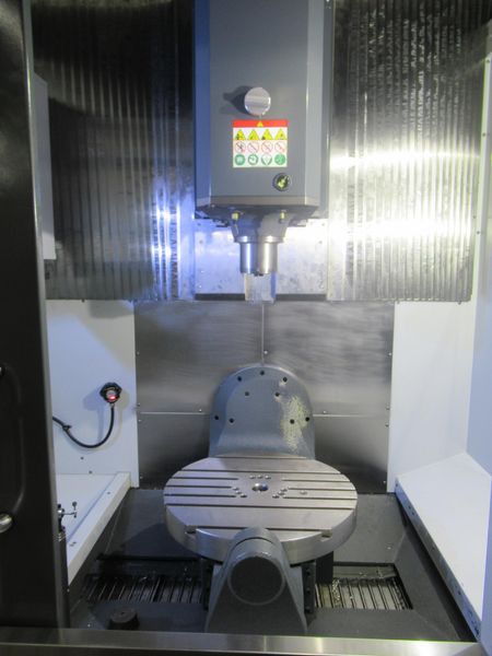 Haas UMC-1000SS CNC 5-Axis Vertical Machining Center, 40"x25"x25", 12K RPM, Chip Con, 30 ATC, Probing, TS Coolant, Air-Vise